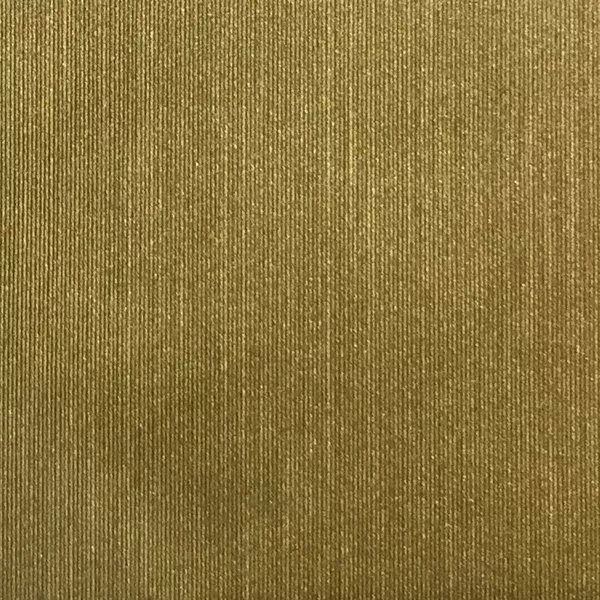 A close-up of Pearl Synthetic Leather reveals a vertically ribbed texture with a subtle sheen in a rich, golden hue.