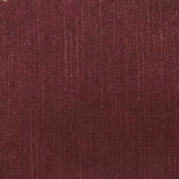 A close-up of Pearl Synthetic Leather in dark charcoal gray shows a fine, vertical ribbed texture with a subtle sheen.