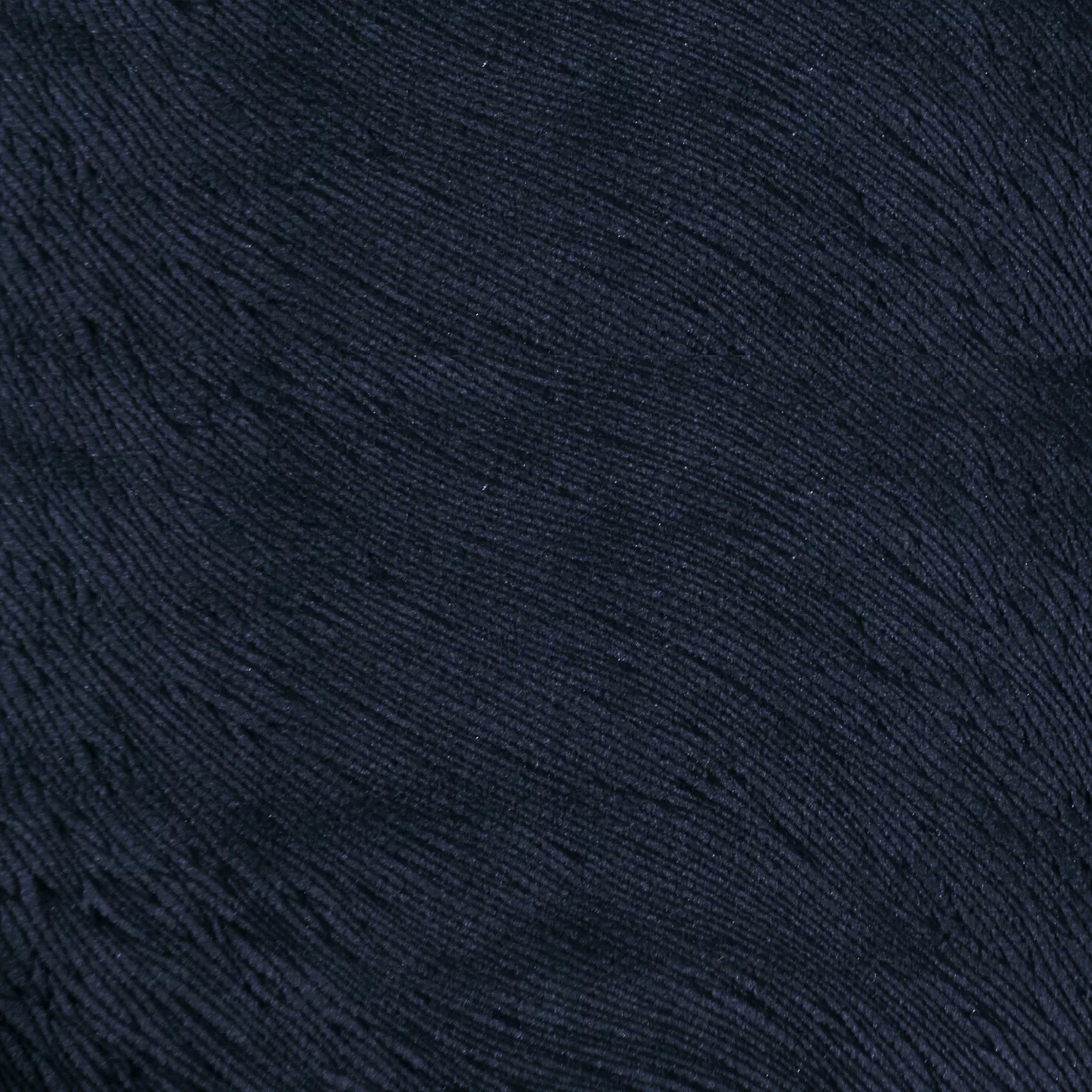 A close-up look at the textured surface of Hide Velvet 053 fabric in a deep navy blue.