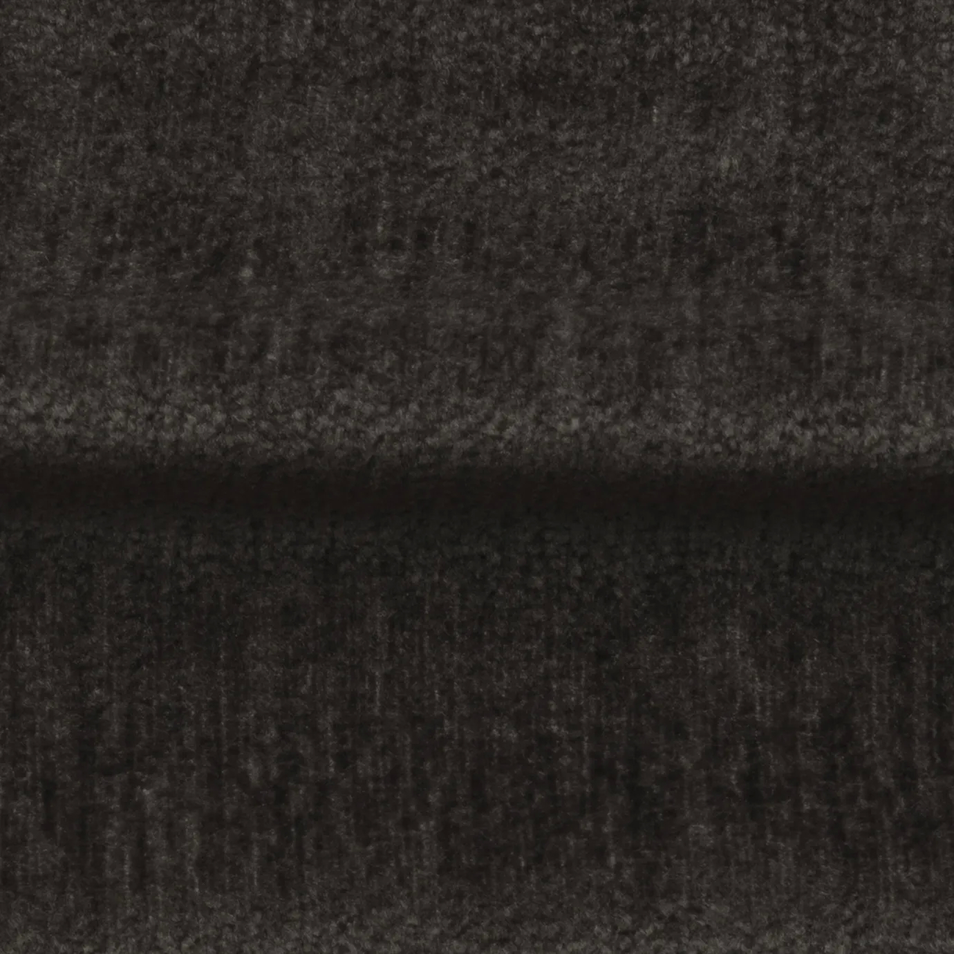 Textured, deep stone gray Belle Velvet fabric with subtle variations in shading across its soft surface.