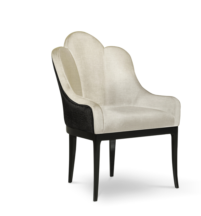 Anastasia Dining Chair: in black and white hues, this chair balances a minimal aesthetic with its flowing lines combining in a timeless elegance.