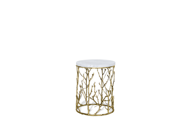 Enchanted Side Table has a golden structure resembling branches and a luxurious white top.