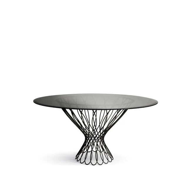 Sophisticated bronze glass top resting on the interlaced black sillhouette-shaped structure.