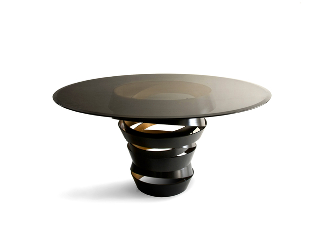 Intuition Dining Table: Bronze glass table top on a swirling black metal structure.