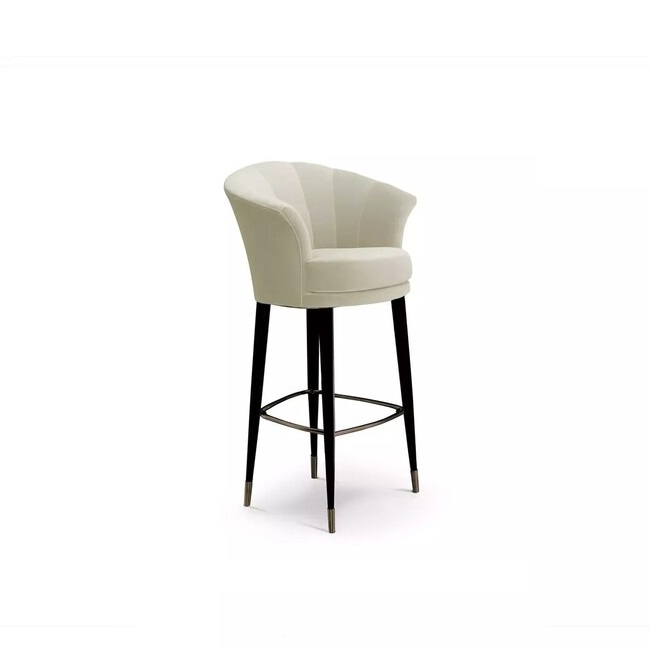 Besame Bar Stool: this elegant bar stool features a cream upholstery, contrasting with the black structure with golden details.