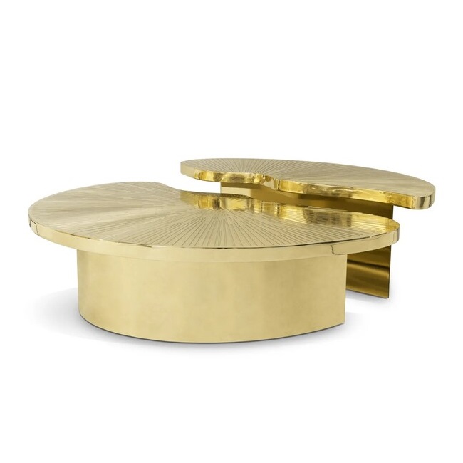 Myth Coffee Table features two individual polished brass parts, in golden hues, that can be set in different positions and form a round shape. The table top is engraved on top.