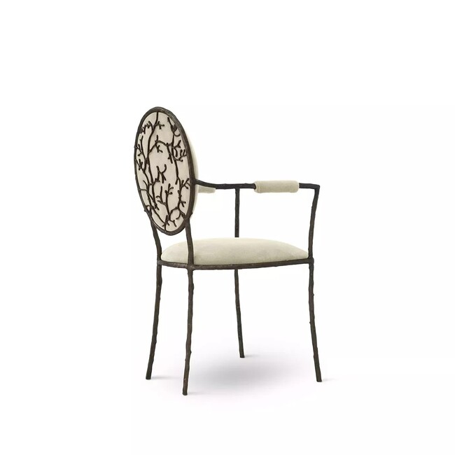 Enchanted Arm Dining Chair features an aged brass frame resembling branches and luxurious cream upholstery.