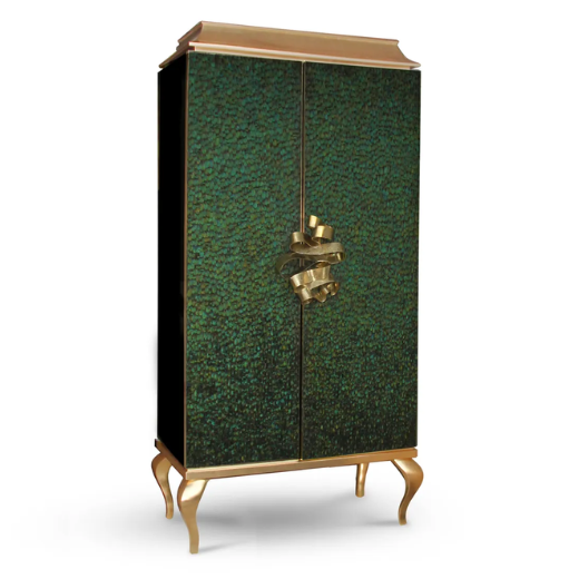 Covered in delicate dark green peacock feathers, Divine Peacock Feather Armoire has a golden frame and is adorned with a golden handle resembling a ribbon.