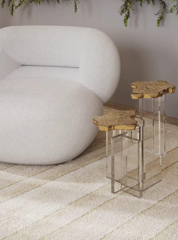 Artistic gold side table inspired by Monet with cast brass and sculptural design