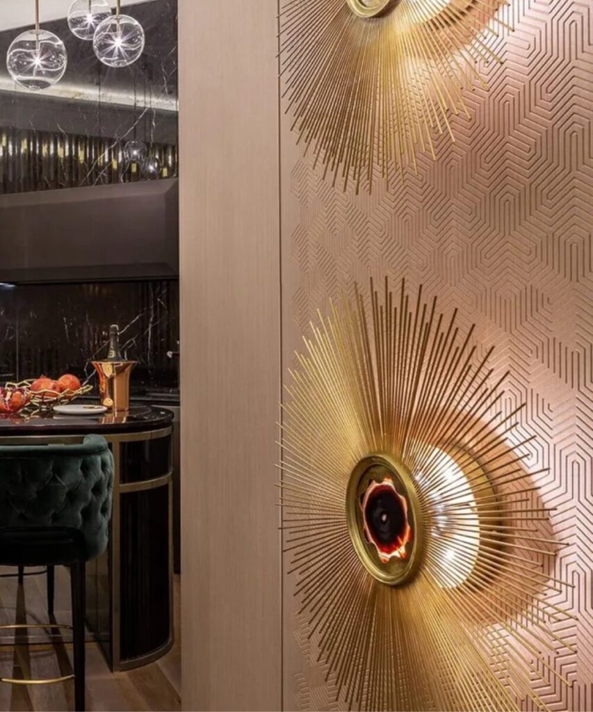 Luxury wall sconce with agate stones and metallic rays, perfect for upscale living rooms.