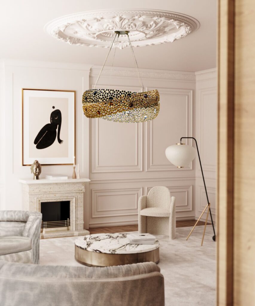 Modern luxury chandelier with brass and crystal rings in an elegant interior.