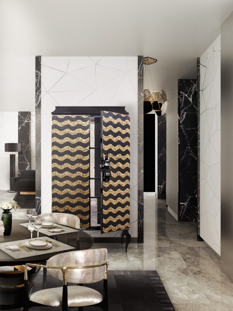 Sophisticated dining room interior featuring the feathered Divine Armoire by KOKET.