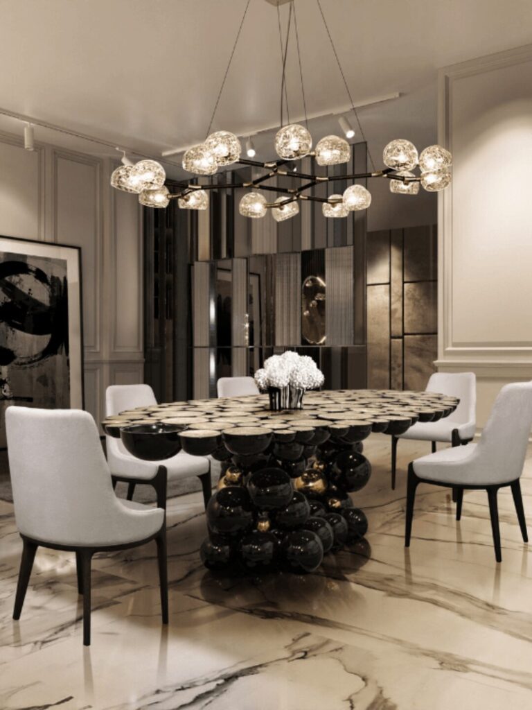Contemporary luxury dining room design with the Newton Table by Covet.