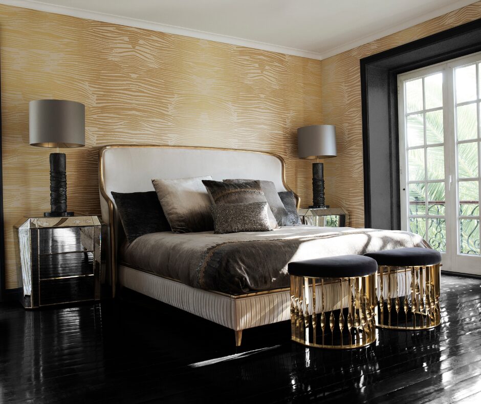Hand-carved headboard with metallic leaf details.